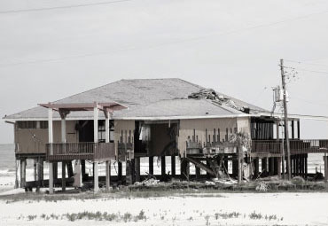 Wind damage - spray foam can help prevent uplift to Bella Vista roofs